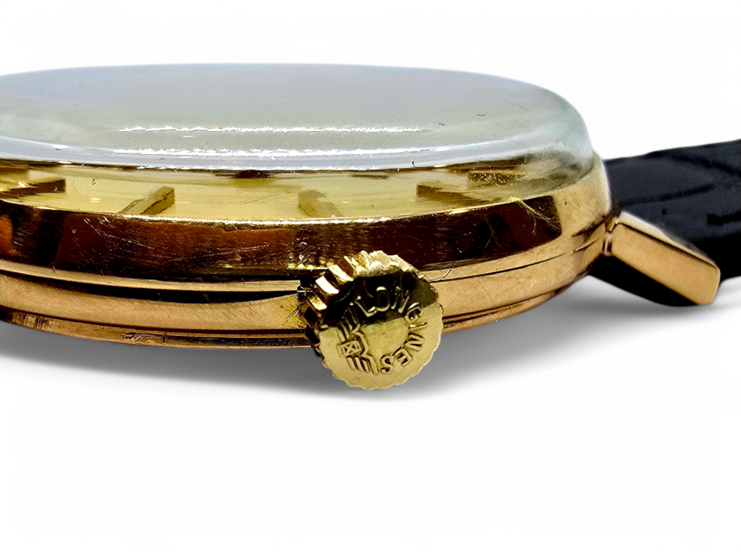Reloj Longines de caballero en oro 18K.