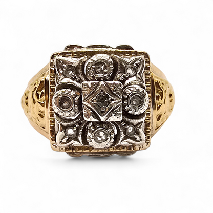 Sortija bicolor en oro de 18k, plata y diamantes.