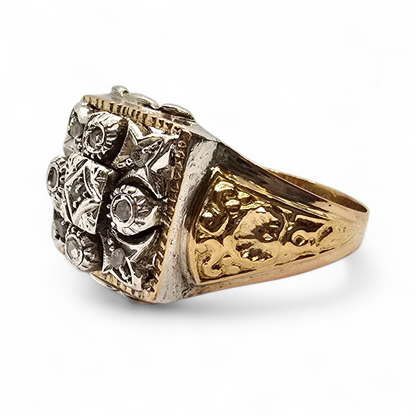 Sortija bicolor en oro de 18k, plata y diamantes.