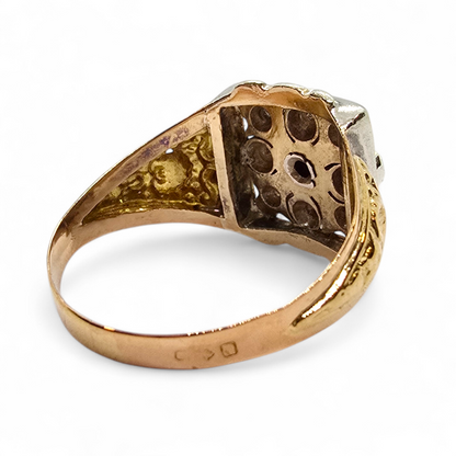Sortija bicolor en oro de 18k, plata y diamantes.
