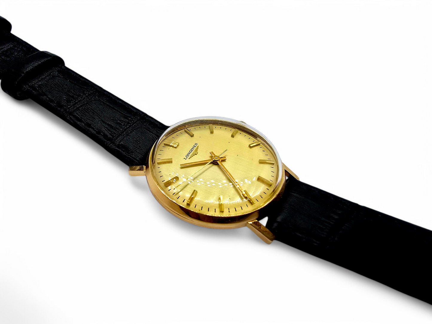 Reloj Longines de caballero en oro 18K.