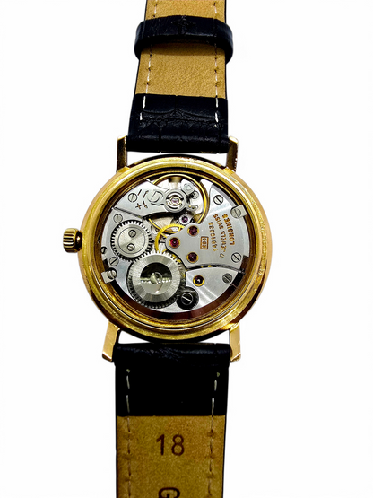 Reloj Longines de caballero en oro 18K.