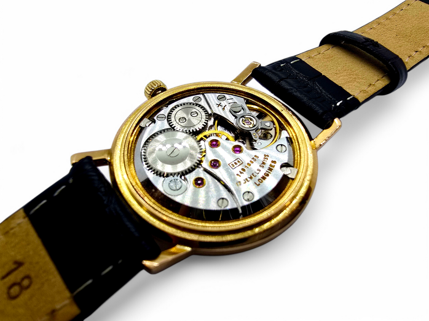 Reloj Longines de caballero en oro 18K.