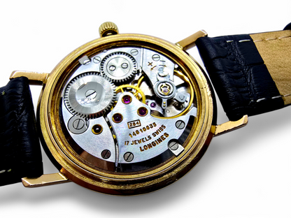 Reloj Longines de caballero en oro 18K.