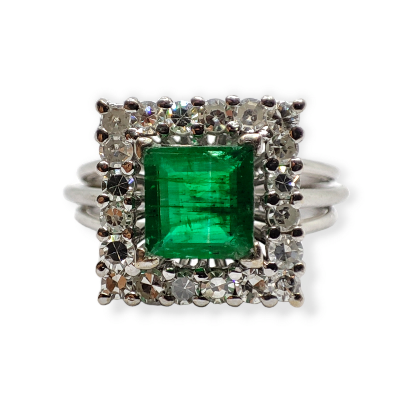Sortija bailarina esmeralda y diamantes en Oro blanco de 18 K